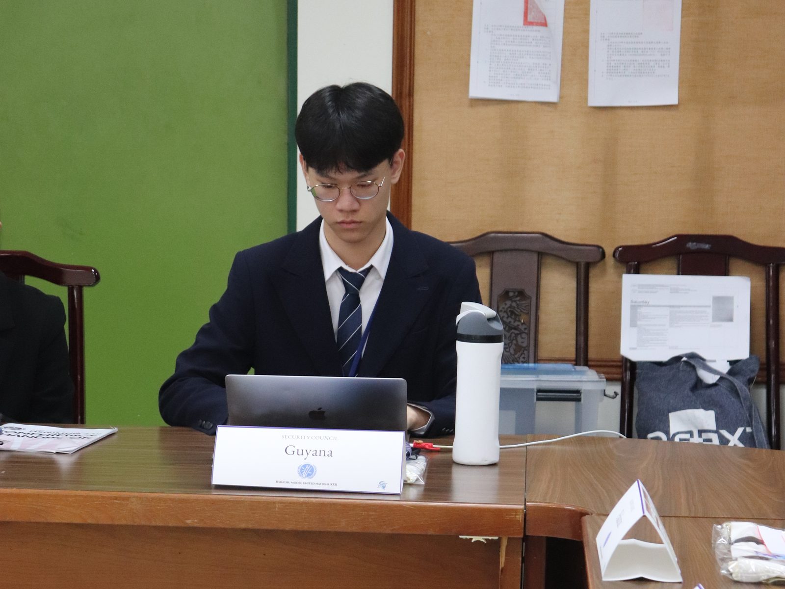 A TYAS delegate representing Guyana at the committee table